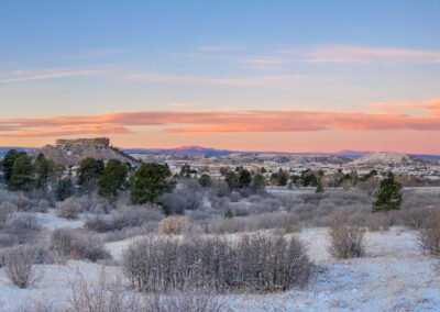 Panoramic Photo of Pink Clouds and Blue Skies at Sunrise over Castle Rock CO