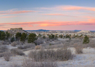 Panoramic Photo of Fresh Snow in Fall with Pastel Pink Skies at Sunrise in Castle Rock