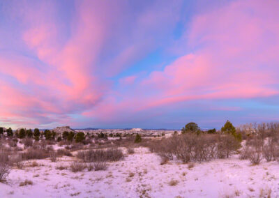 Panoramic Photo of Pink Clouds at Dawn over the Castle Rock Star with Fresh Snow