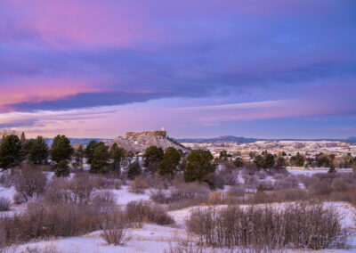 Photo of Illuminated Star over the Rock at Dawn in Castle Rock Star CO after an Overnight Snow