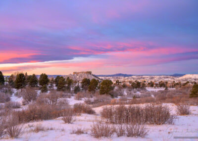 Fresh Snow Reflecting Purple and Pink Light from the Clouds at Dawn in Castle Rock CO