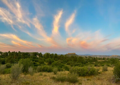 Panoramic Photo of Wind Swept Clouds at Sunrise Castle Rock CO