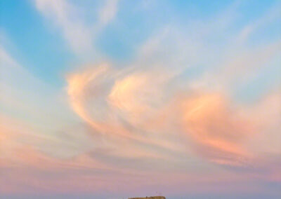 Vertical Photo of Dancing Clouds at Sunrise Castle Rock CO