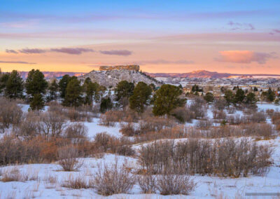 Pink Orange and Blue Skies over Winter Scene In Castle Rock CO