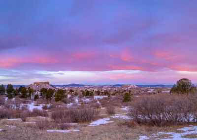 Panoramic Photo of Stunning Pink and Blue Skies over Castle Rock Colorado in the Winter