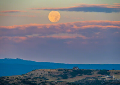 Purple Pink Sunrise with Full Moon over Devils Head Summit