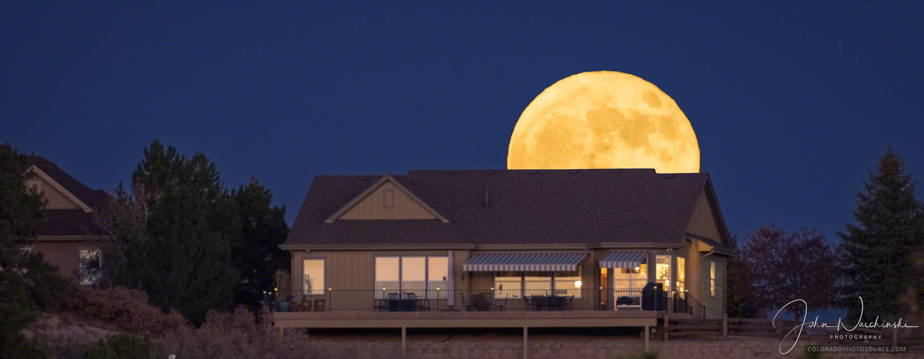 Photos of a Rare All Hallows' Even Blue Moon as seen in Colorado